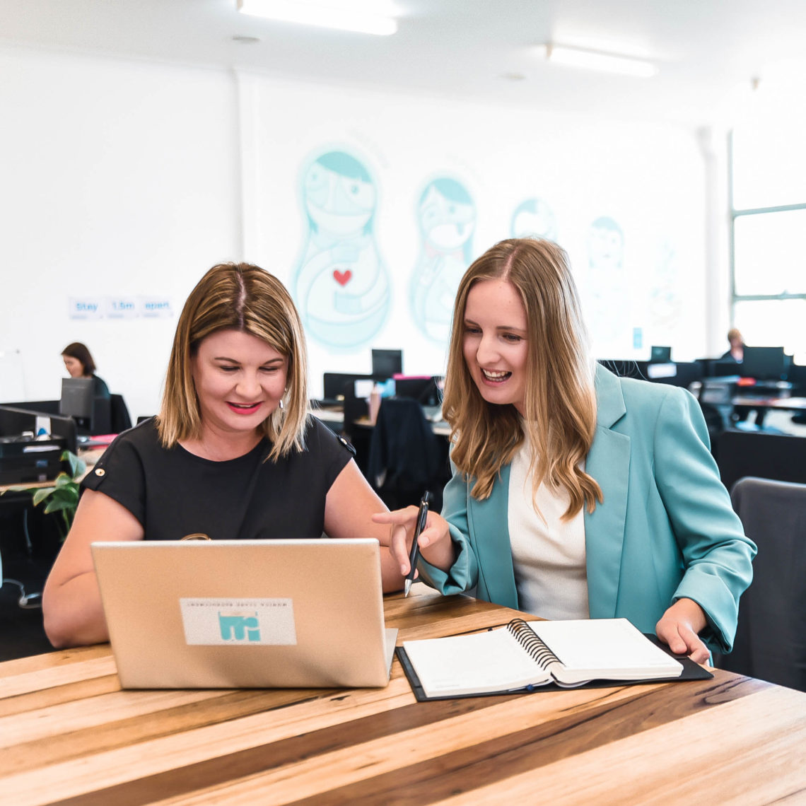 Melanie Silburn in the office with her colleague